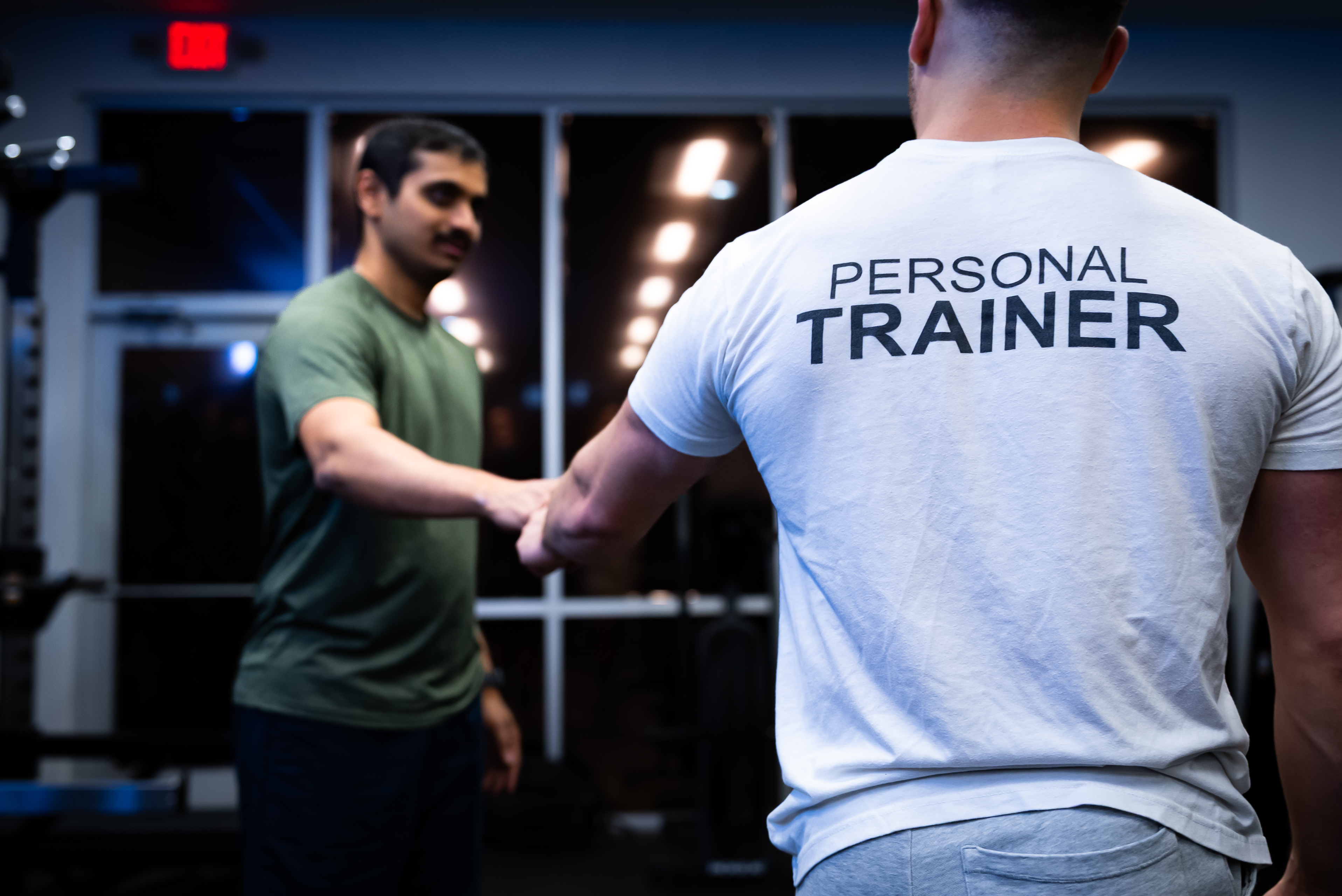Job well done fist bump between client and trainer