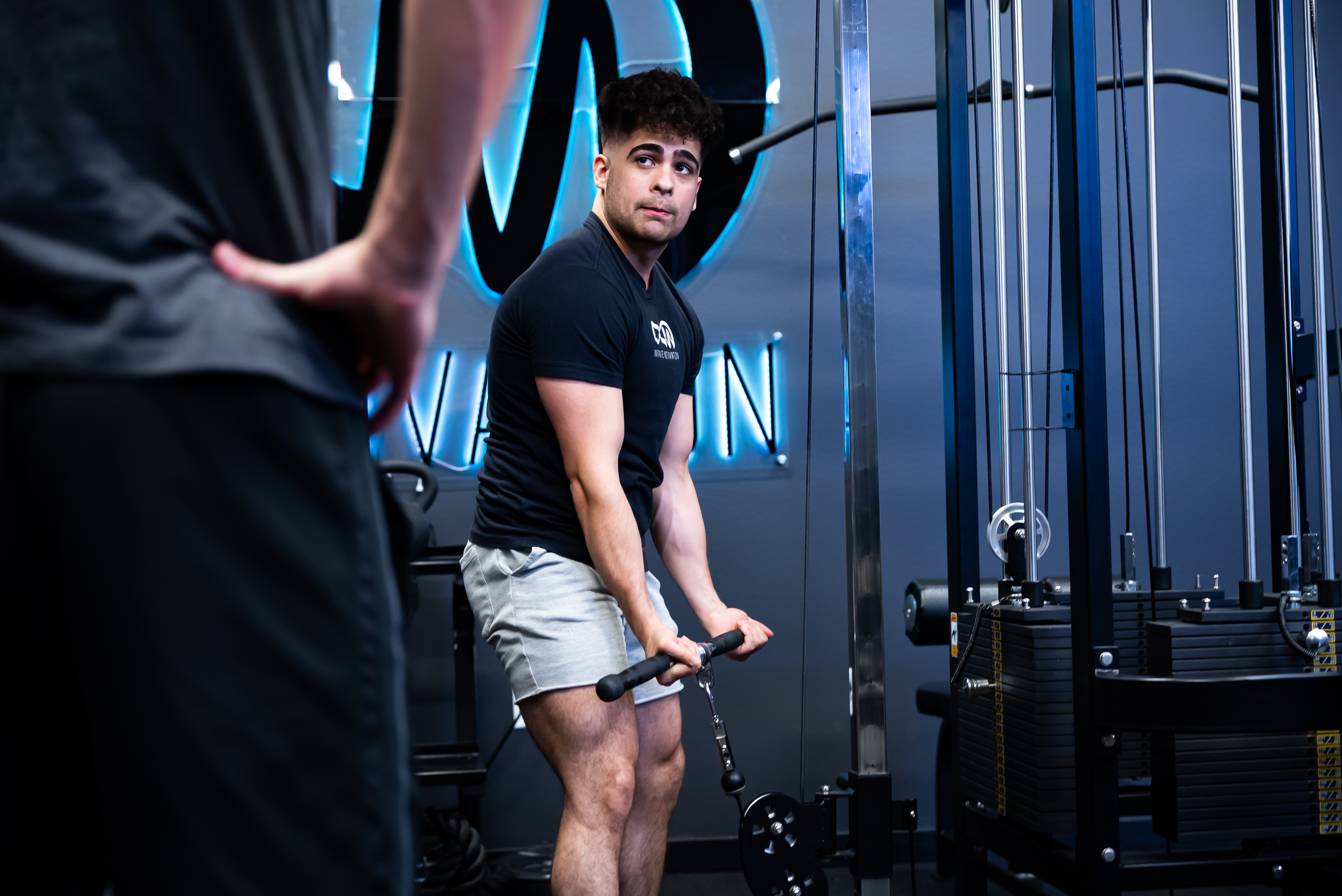 Personal training session showing detailed instruction and education